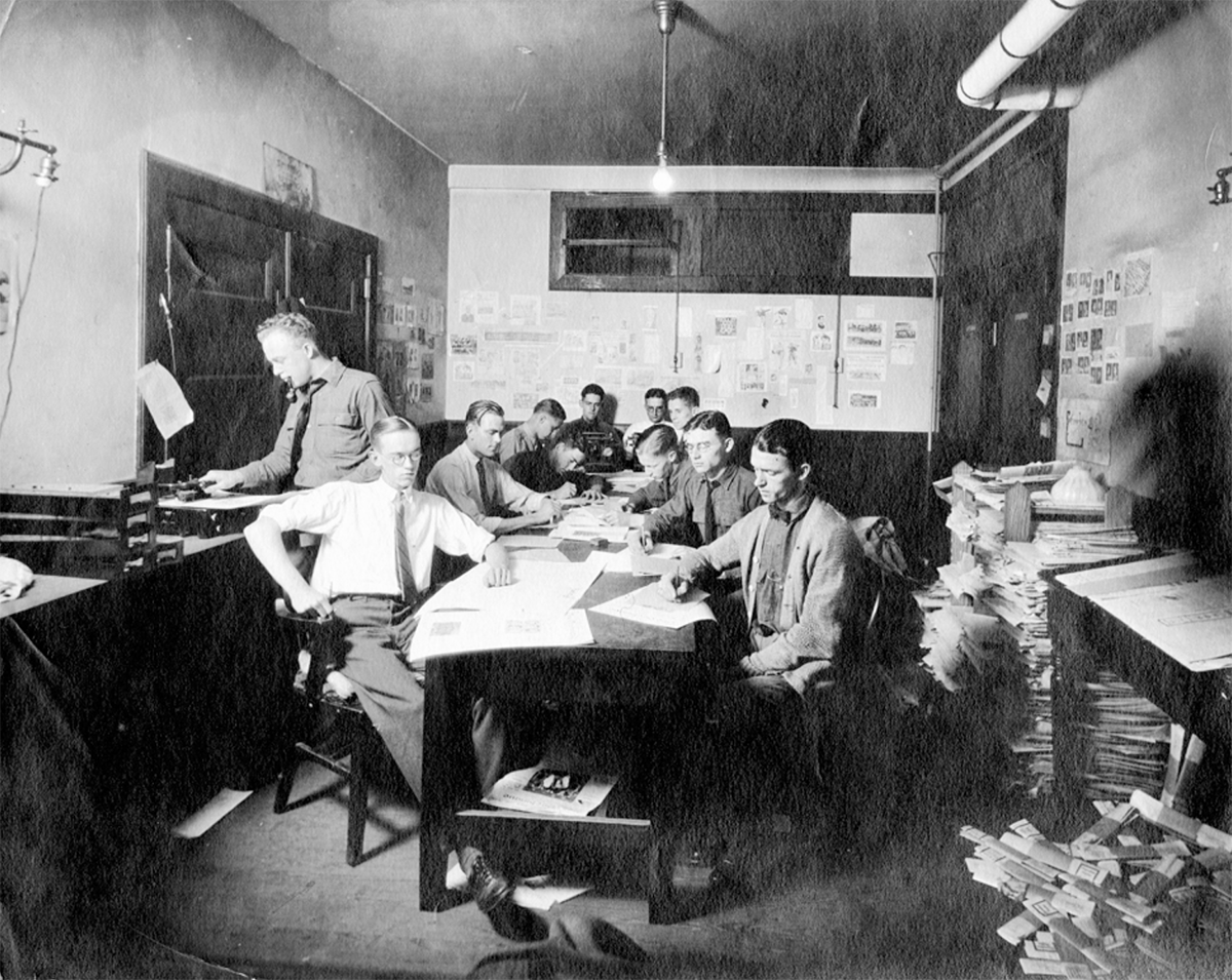 The 1911 Techinque staff in the newsroom.